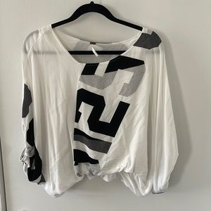 Cropped black and white blouse